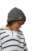 Kids' baby alpaca cable hat in botanical green, close-up